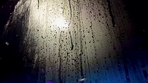 Raindrops on the car window Vídeo Stock 309870857