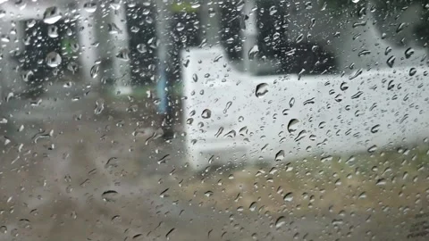 Raindrops on the car window Stock Footage 310922893