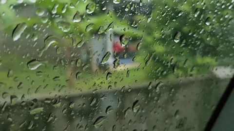 Raindrops on the car window Stock Footage 310922896