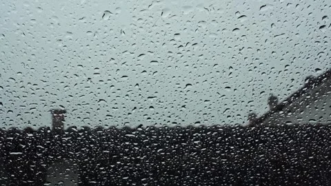 Raindrops on Car Window with Sky Background – 4K Stock Footage 311203442