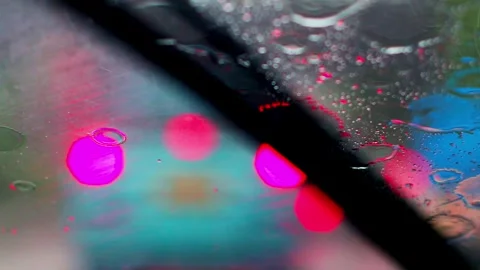 Raindrops on a car windshield 2 Stock Footage 329902294
