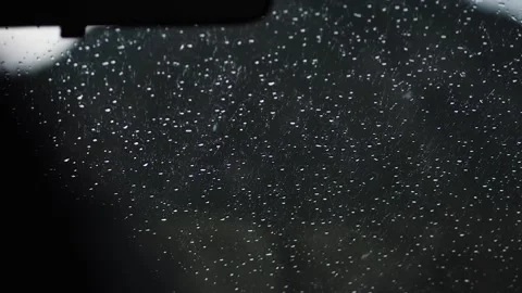 Raindrops on car windshield, car wipers Stock Footage 137228247