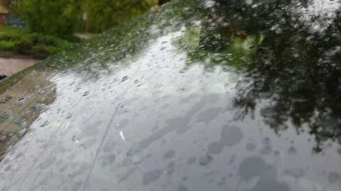 Raindrops on the car windshield, climate change, heavy downpours Video stock 130777412