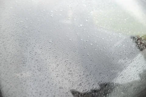 Raindrops on car windshield close up Stock Photos