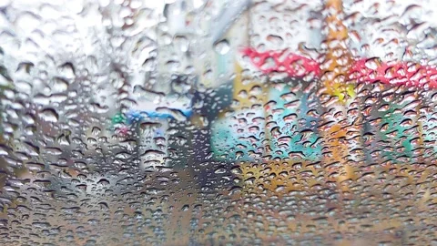 Raindrops on the car windshield Stock Footage 165688523