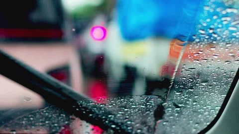 Raindrops on a car windshield Stock Footage 329902290