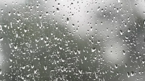 Raindrops on Car Windshield Glass - Heavy Rain Abstract Backgro Stock Footage 335393151