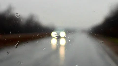 Raindrops on a car windshield h Stock Footage 37320235