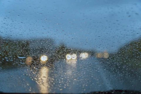 Raindrops on the car windshield at night Stock-Fotos