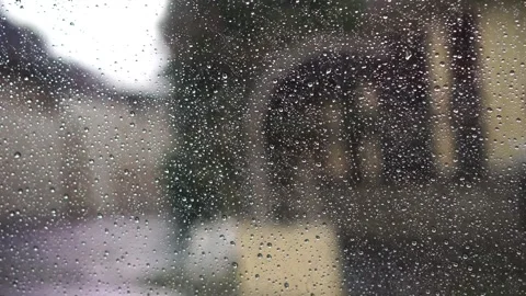 Raindrops on the car's side window Video stock 272588229