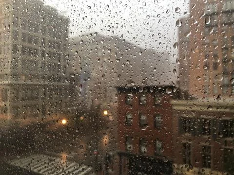 Raindrops on a City Window 库存照片