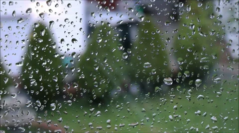 Raindrops collect on window Video stock 29644074