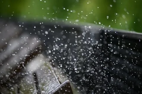 Raindrops on a dark background Stock Photos