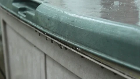 Raindrops Drip Off Of Green Outdoor Deck Box Stock Footage 106673375