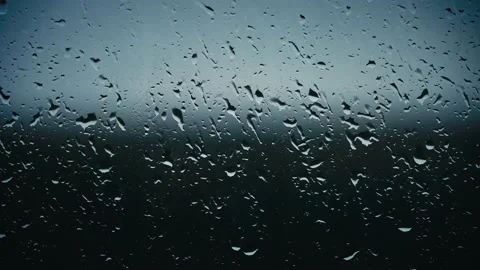 Raindrops Drip on the Stele in the Window Close-up Stock Footage 218227779