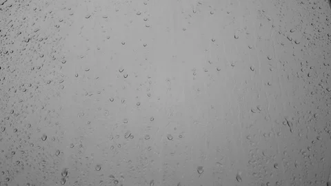 Raindrops dripping and running down the window in the rain. Stock Footage 196175059