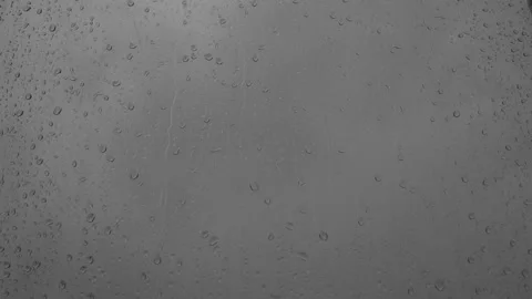 Raindrops dripping and running down the window in the rain. Stock Footage 196175520