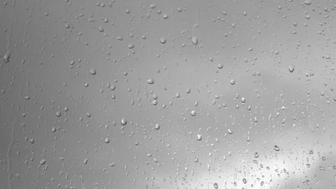 Raindrops dripping and running down the window in the rain. Stock Footage 196175664