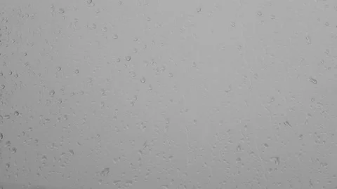 Raindrops dripping and running down the window in the rain. Stock Footage 196175918