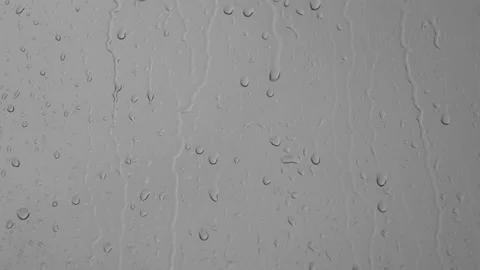 Raindrops dripping and running down the window in the rain. Stock Footage 196178425