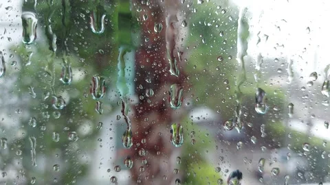 Raindrops dripping down the window Stock Footage 157987737