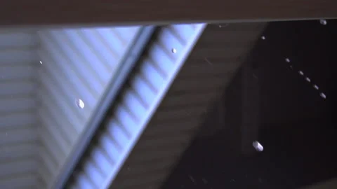Raindrops dripping from the roof Stock Footage 138903019