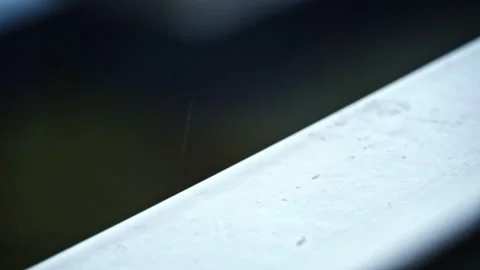 Raindrops Dripping on the Window and Windowsill in Slow Motion in Cloudy Weather Stock Footage 260503450