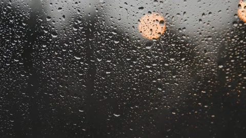 Raindrops dripping on the window. Stock Footage 133318056