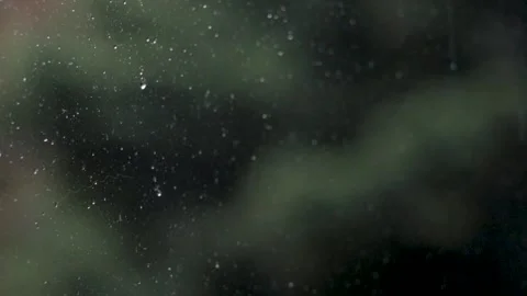 Raindrops droplets close up on a window glass Stock Footage 313224398