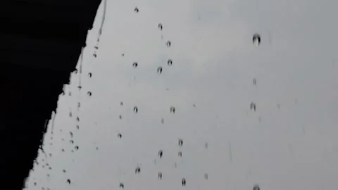 Raindrops from the edge of the roof Stock Footage 289931963