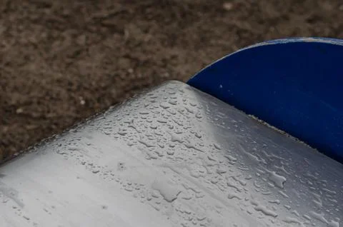 Raindrops on an empty slide for children. Stock Photos