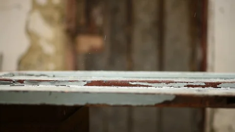 Raindrops fall on a blue surface Stock Footage 129625142