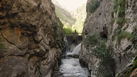 Raindrops fall down washing bare rocky cliffs of canyon Stock Footage 208211337