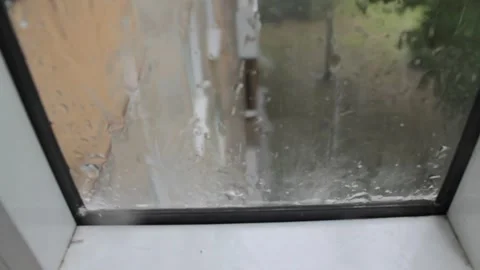 Raindrops fall on the edge of the window 動画素材 155826080