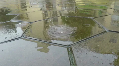 Raindrops Fall to Flagstones. Stock Footage 52098267
