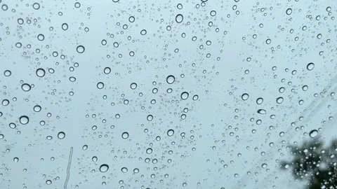 Raindrops fall on the glass Stock Footage 312967059