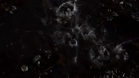 Raindrops fall into a large puddle as a background. Stock Footage 114295303