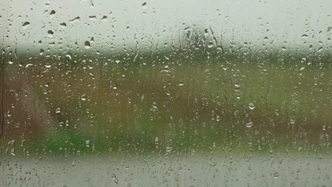 Raindrops fall over glass, 4K timelapse Stock-Footage 90837661