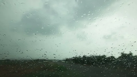 Raindrops fall over glass, Timelapse 4K Stock-Footage 90837660