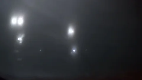Raindrops fall at puddle with neon lights Stock Footage 102767467