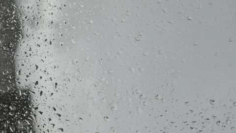 Raindrops fall through the window. Stock Footage 255895656
