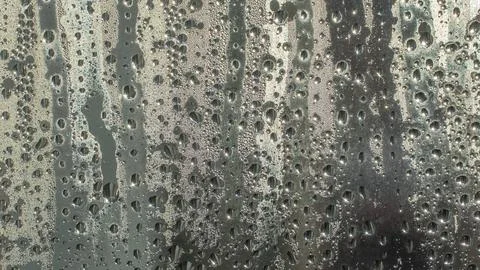 Raindrops fall on the window close-up. Rain, rainy, depressive, dreary weat.. Stock Photos