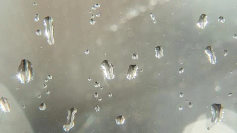 Raindrops fall on the window close-up. Rain, rainy, depressive, dreary weat.. Stock Photos