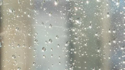 Raindrops fall on the window close-up. Rain, rainy, depressive, dreary weat.. Stock Photos