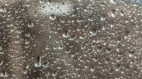 Raindrops fall on the window close-up. Rain, rainy, depressive, dreary weat.. Stock Photos