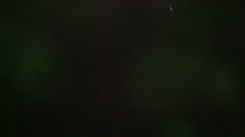 Raindrops falling against black background Stock Footage 316503368