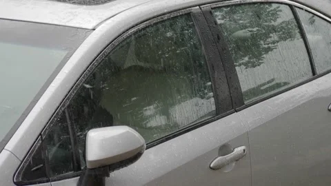 Raindrops falling on a car Video stock 171380176