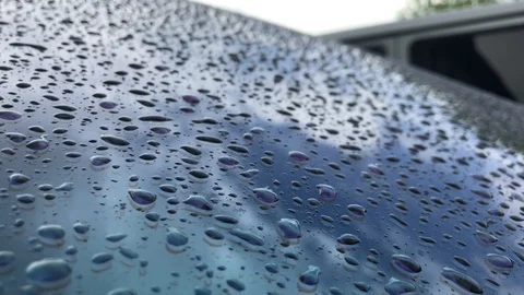 Raindrops falling on car glass Stock Footage 119078562