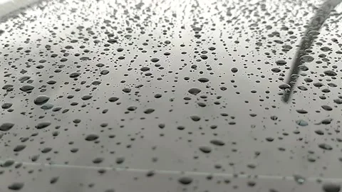 Raindrops falling on the car window Stock Footage 219020392