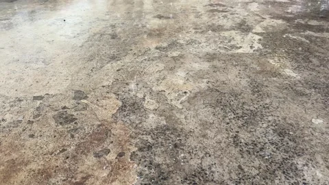 Raindrops Falling on Concrete Surface with Authentic Rain Sound Video stock 339264821
